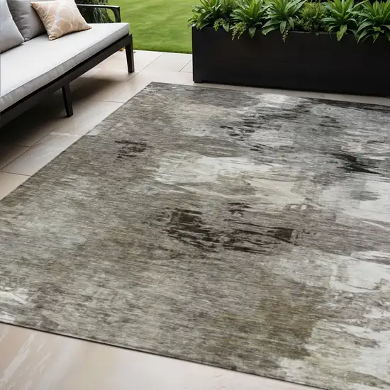 Taupe Beige And Ivory Abstract Washable Indoor Outdoor Area Rug Photo 1