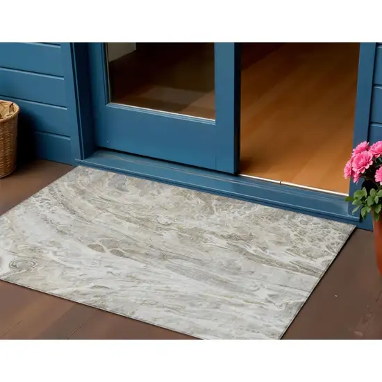 Taupe Beige And Ivory Abstract Washable Indoor Outdoor Area Rug Photo 1