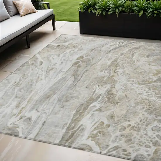 Taupe Beige And Ivory Abstract Washable Indoor Outdoor Area Rug Photo 1