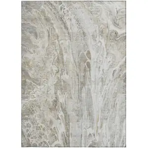 Photo of Taupe Beige And Ivory Abstract Washable Indoor Outdoor Area Rug