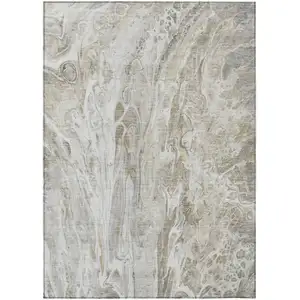 Photo of Taupe Beige And Ivory Abstract Washable Indoor Outdoor Area Rug