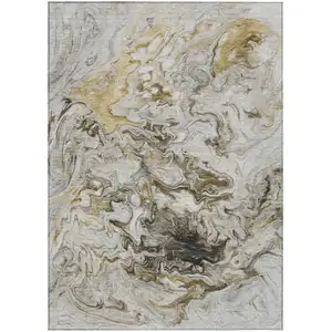 Photo of Taupe Beige And Ivory Abstract Washable Indoor Outdoor Area Rug