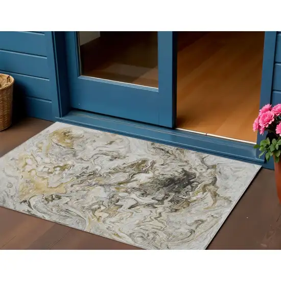 Taupe Beige And Ivory Abstract Washable Indoor Outdoor Area Rug Photo 1