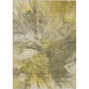 Photo of Taupe Beige And Ivory Abstract Washable Indoor Outdoor Area Rug