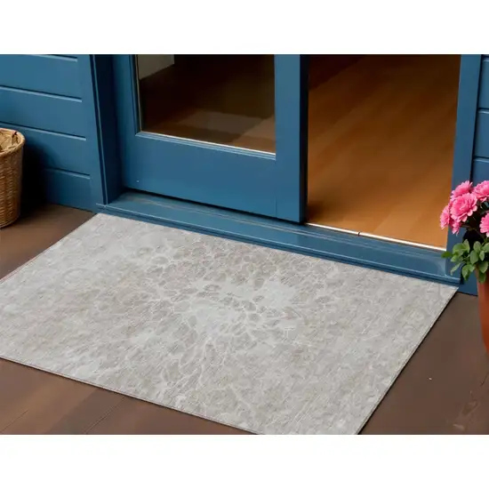 Taupe Beige And Ivory Abstract Washable Indoor Outdoor Area Rug Photo 1