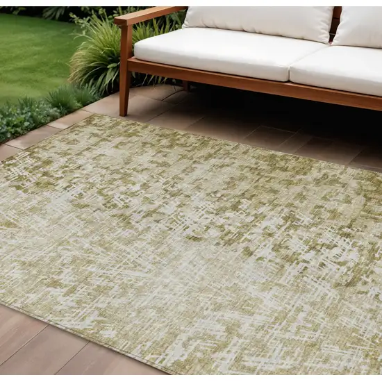 Taupe Beige And Ivory Abstract Washable Indoor Outdoor Area Rug Photo 1