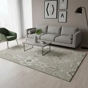 Photo of Taupe Beige And Ivory Floral Washable Area Rug With UV Protection