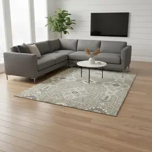 Photo of Taupe Beige And Ivory Floral Washable Area Rug With UV Protection