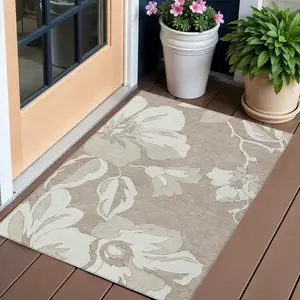 Photo of Taupe Beige And Ivory Floral Washable Indoor Outdoor Area Rug
