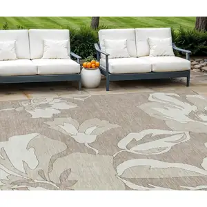 Photo of Taupe Beige And Ivory Floral Washable Indoor Outdoor Area Rug