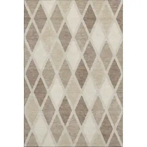 Photo of Taupe Beige And Ivory Geometric Washable Area Rug With UV Protection