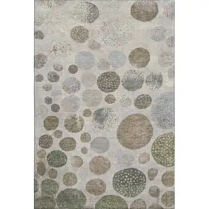 Photo of Taupe Beige And Ivory Geometric Washable Area Rug With UV Protection