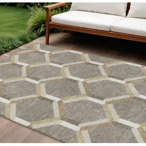 Photo of Taupe Beige And Ivory Geometric Washable Indoor Outdoor Area Rug