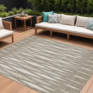 Photo of Taupe Beige And Ivory Geometric Washable Indoor Outdoor Area Rug