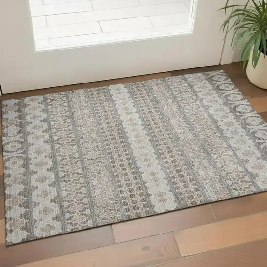 Taupe Beige And Ivory Ikat Washable Area Rug With UV Protection Photo 1