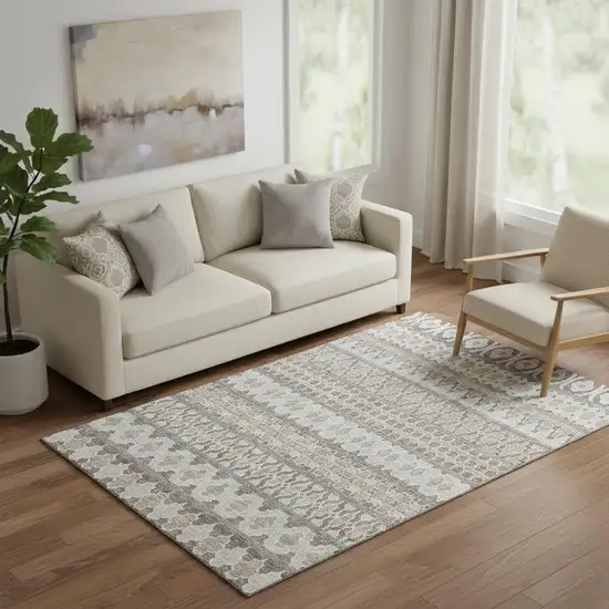 Taupe Beige And Ivory Ikat Washable Area Rug With UV Protection Photo 1