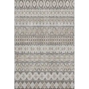 Photo of Taupe Beige And Ivory Ikat Washable Area Rug With UV Protection