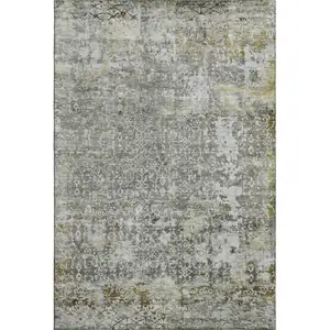 Photo of Taupe Beige And Ivory Oriental Washable Area Rug With UV Protection