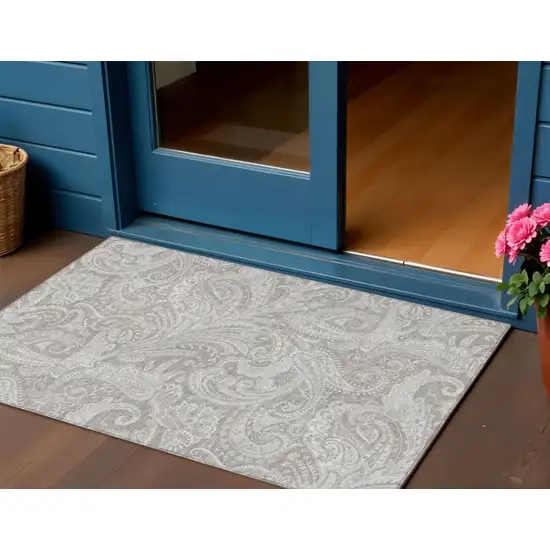 Taupe Beige And Ivory Paisley Washable Indoor Outdoor Area Rug Photo 1