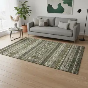 Photo of Taupe Beige And Ivory Southwestern Washable Area Rug With UV Protection