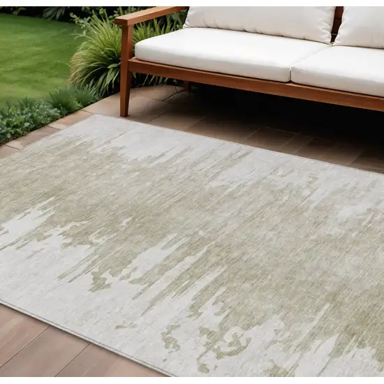 Taupe Beige And Tan Abstract Washable Indoor Outdoor Area Rug Photo 1