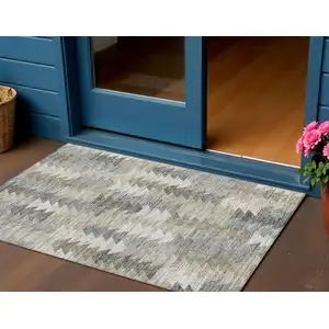 Photo of Taupe Beige And Tan Geometric Washable Indoor Outdoor Area Rug