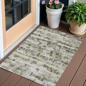 Photo of Taupe Beige And Tan Striped Washable Indoor Outdoor Area Rug
