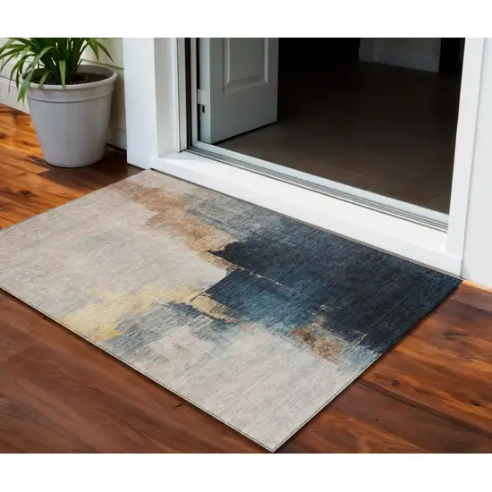 Taupe Black And Blue Abstract Washable Indoor Outdoor Area Rug Photo 1