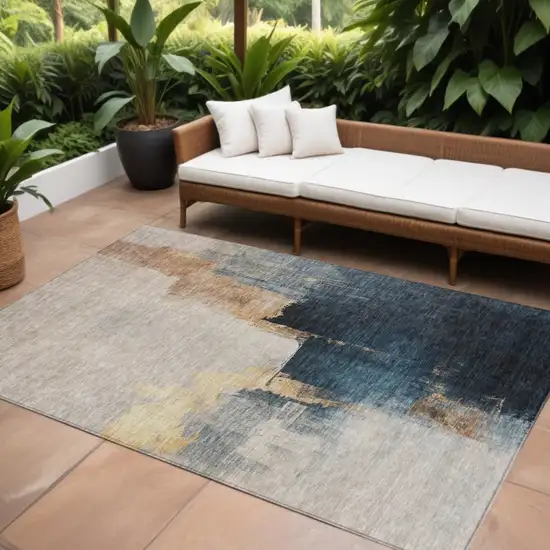 Taupe Black And Blue Abstract Washable Indoor Outdoor Area Rug Photo 1