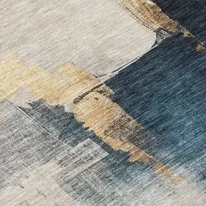 Photo of Taupe Black And Blue Abstract Washable Indoor Outdoor Area Rug