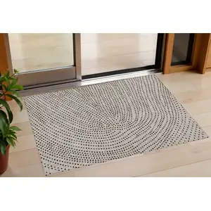 Photo of Taupe Black And Brown Polka Dot Washable Indoor Outdoor Area Rug