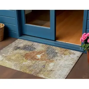 Photo of Taupe Black And Copper Abstract Washable Indoor Outdoor Area Rug