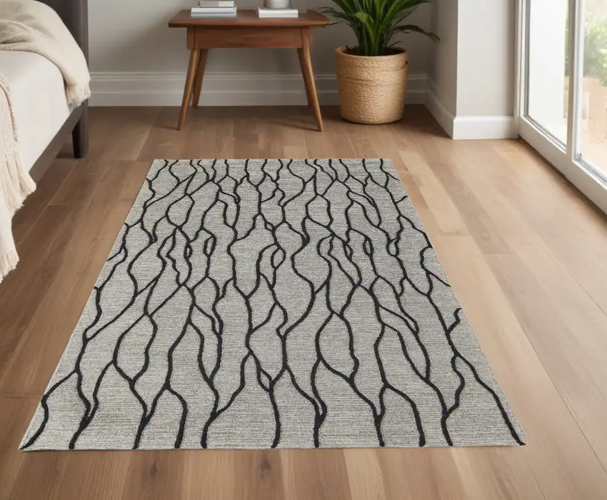 Taupe Black And Gray Wool Abstract Tufted Handmade Stain Resistant Area Rug Photo 1