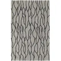 Photo of Taupe Black And Gray Wool Abstract Tufted Handmade Stain Resistant Area Rug