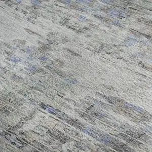 Photo of Taupe Blue And Gray Abstract Washable Area Rug With UV Protection