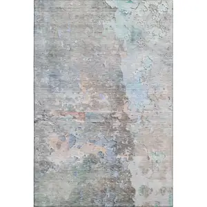 Photo of Taupe Blue And Gray Abstract Washable Area Rug With UV Protection