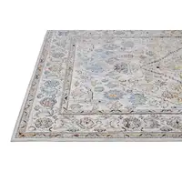 Photo of Taupe Blue And Gray Floral Stain Resistant Area Rug