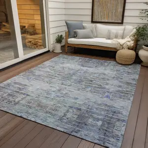 Photo of Taupe Blue And Green Abstract Washable Indoor Outdoor Area Rug