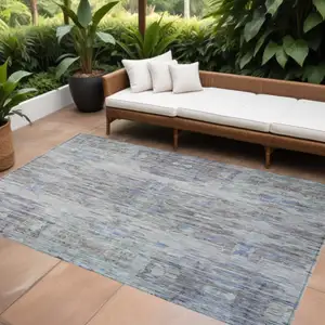 Photo of Taupe Blue And Green Abstract Washable Indoor Outdoor Area Rug