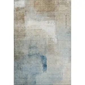 Photo of Taupe Blue And Ivory Abstract Washable Area Rug With UV Protection