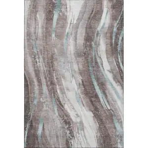 Photo of Taupe Blue And Ivory Abstract Washable Area Rug With UV Protection