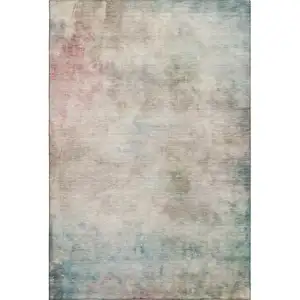 Photo of Taupe Blush And Teal Abstract Washable Area Rug With UV Protection