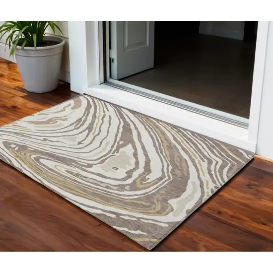 Taupe Brown And Beige Abstract Washable Indoor Outdoor Area Rug Photo 1