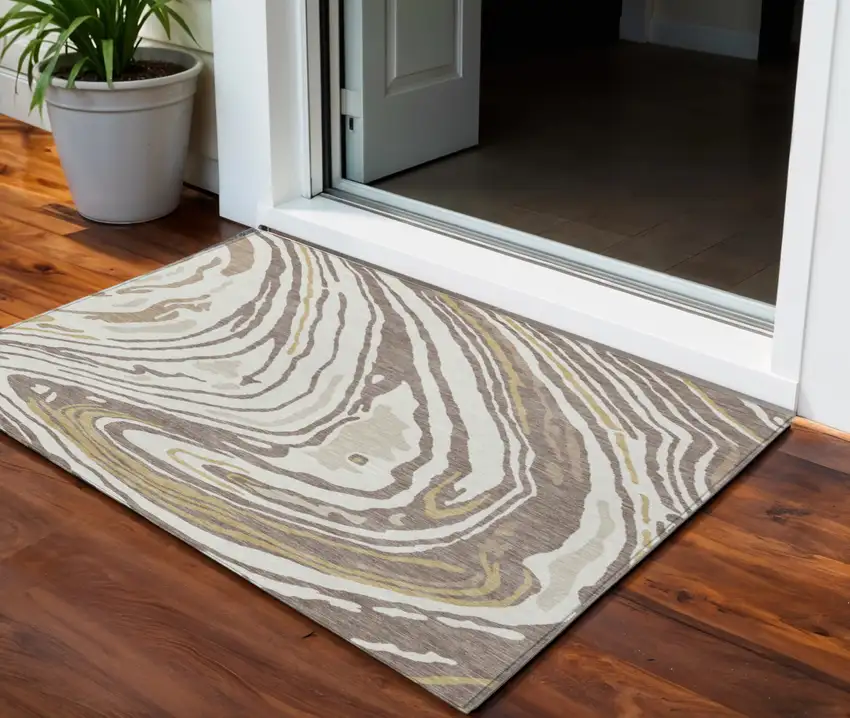 Taupe Brown And Beige Abstract Washable Indoor Outdoor Area Rug Photo 1