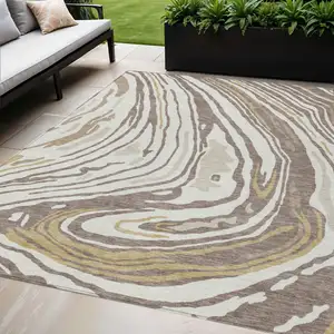 Photo of Taupe Brown And Beige Abstract Washable Indoor Outdoor Area Rug