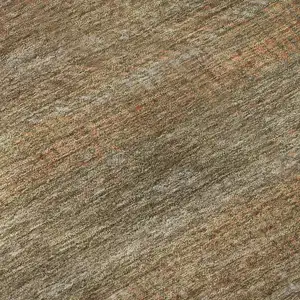 Photo of Taupe Brown And Copper Striped Washable Area Rug With UV Protection