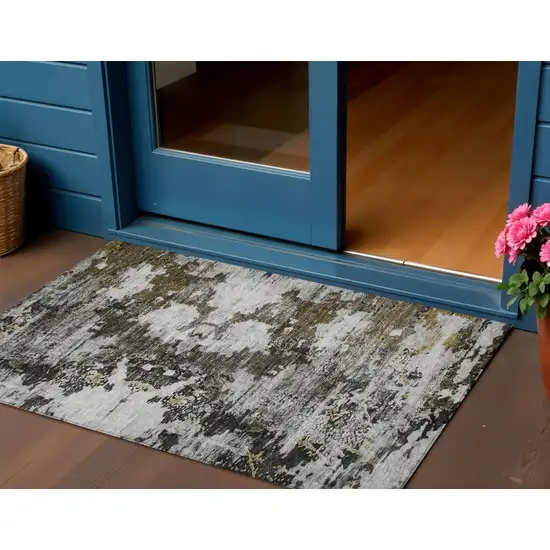 Taupe Brown And Gold Abstract Washable Indoor Outdoor Area Rug Photo 1