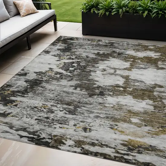 Taupe Brown And Gold Abstract Washable Indoor Outdoor Area Rug Photo 1