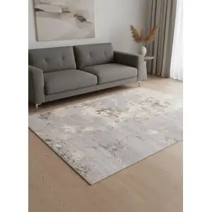 Photo of Taupe Brown And Gray Abstract Area Rug