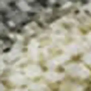 Photo of Taupe Brown And Gray Abstract Washable Area Rug With UV Protection